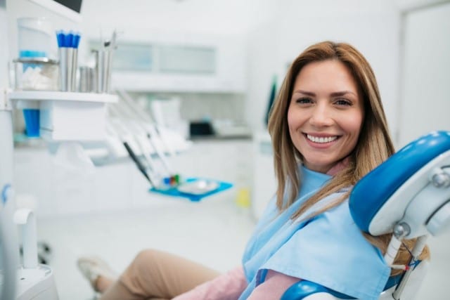 Happy patient at dental office