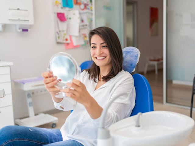 Happy dental clinic patient