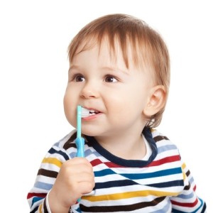 baby brushing teeth