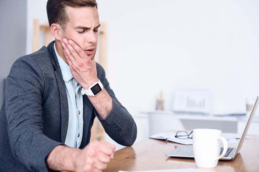 Man with jaw pain