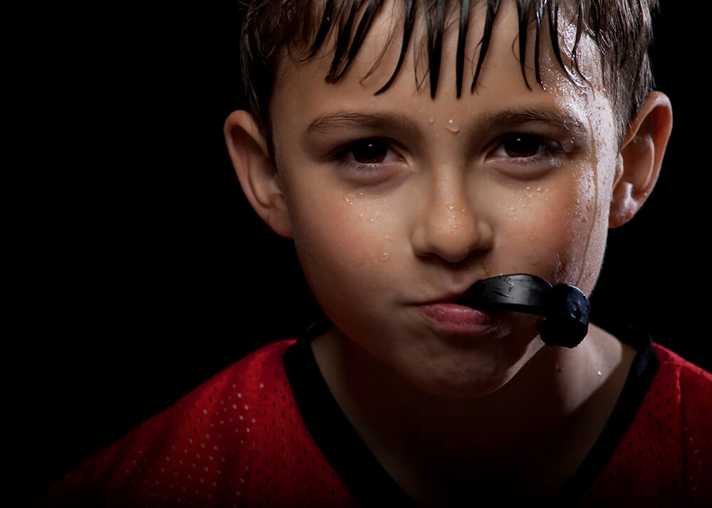 Kid with mouth guard