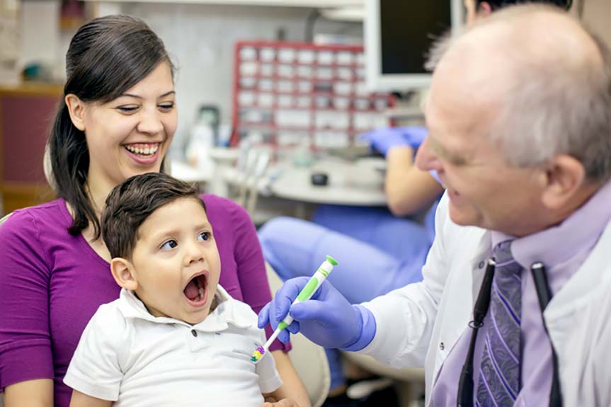 take your child to the dentist twice a year