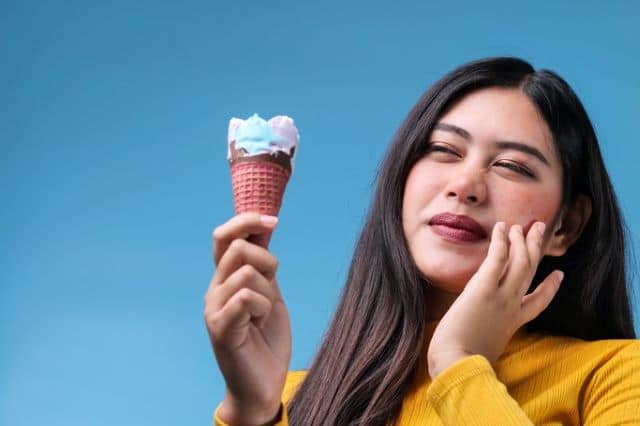 Woman with sensitivity to ice cream
