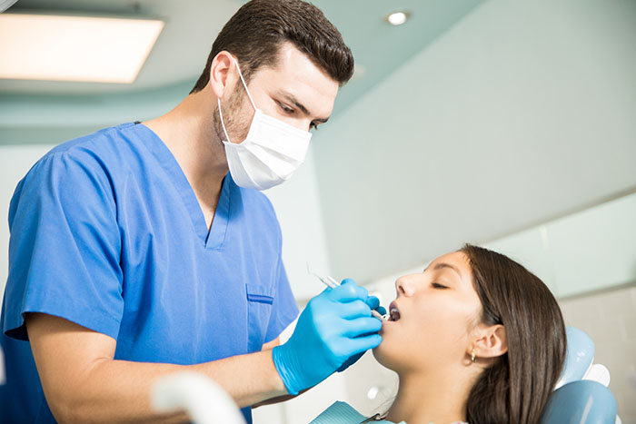 Patient getting dental check up 