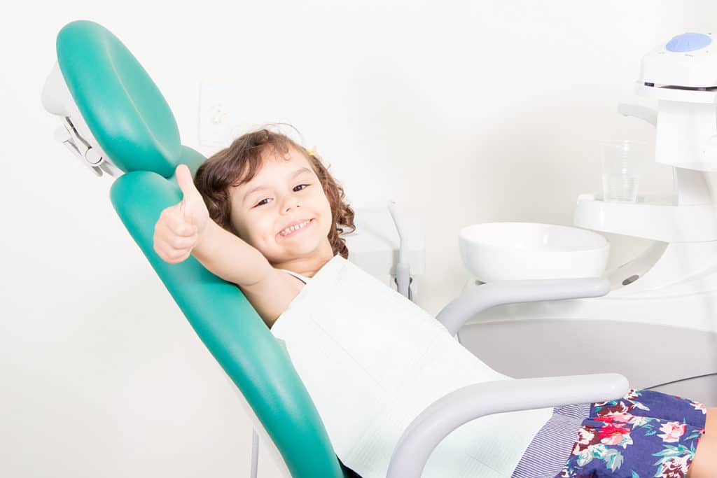 Young girl at the dentist