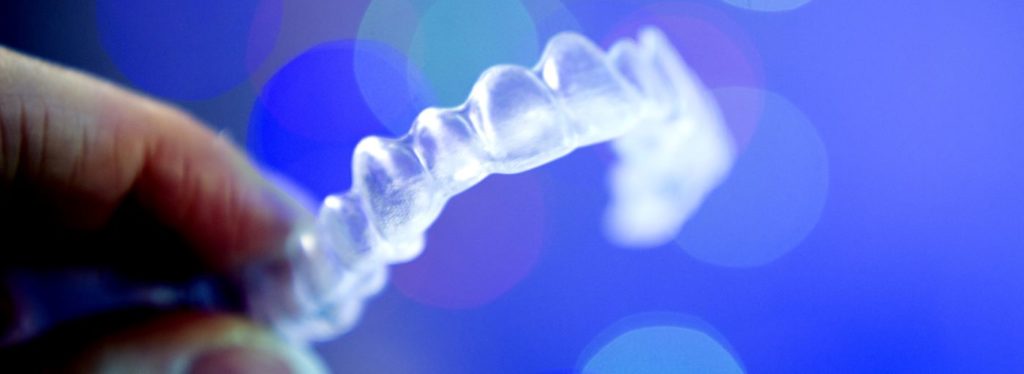 Up-close shot at the Invisalign teeth straightening system