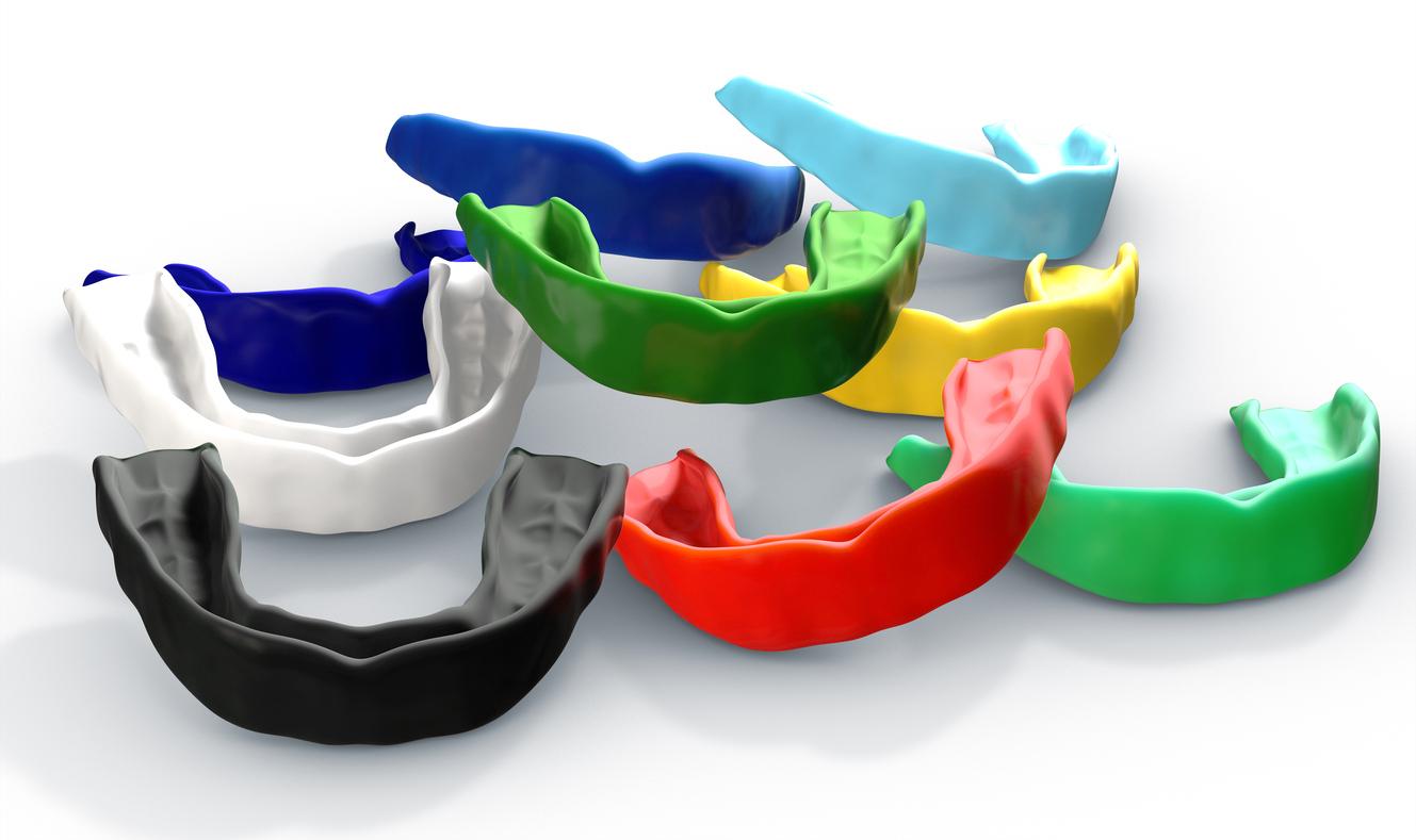 collection of colorful regular moulded sports and night mouthguards