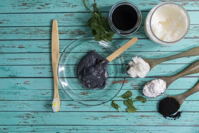 Activated charcoal teeth whitening treatment