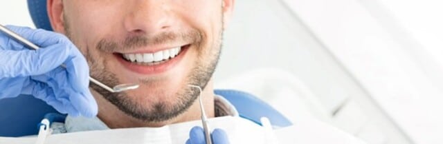 Happy dentist patient