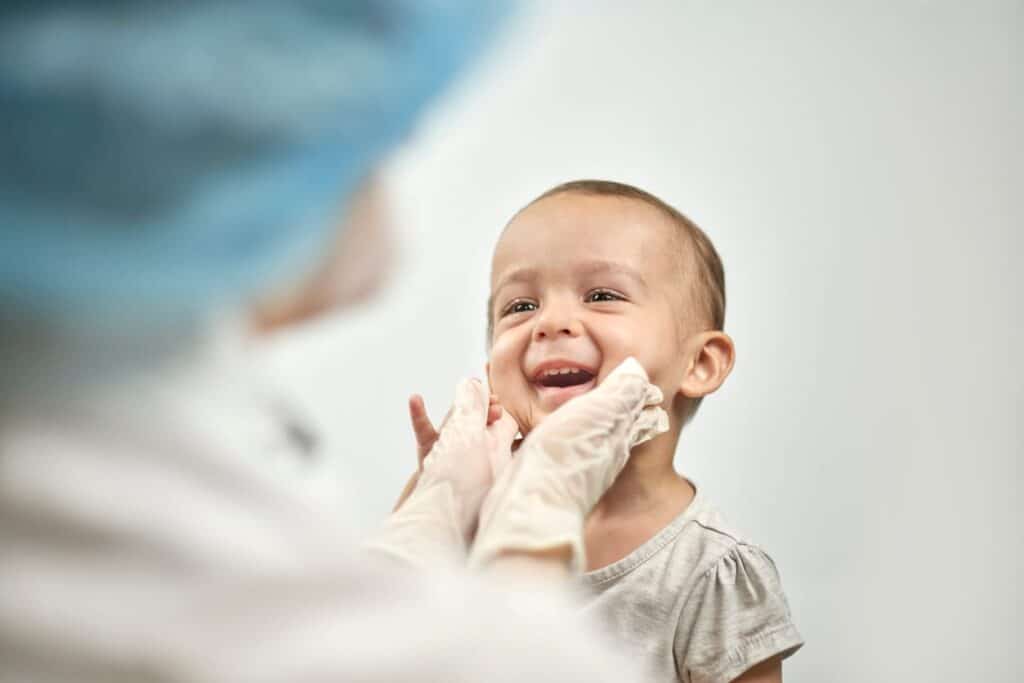A little boy smiling at a pediatric dentist in Las Vegas.