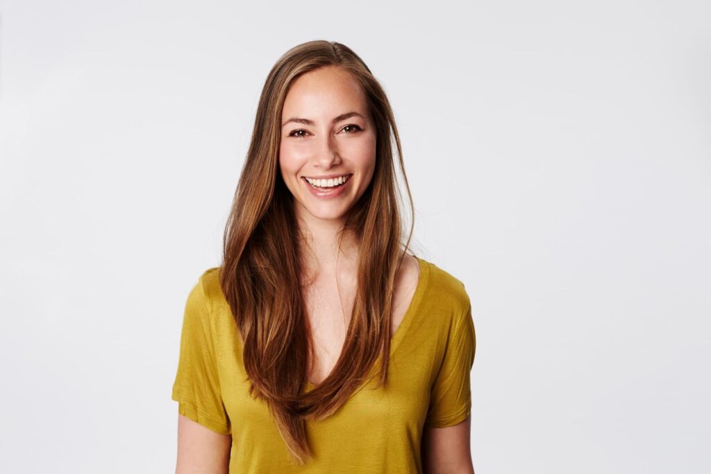 Woman Smiling with grey background