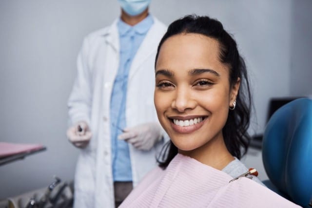 Woman Smiling with Dentist