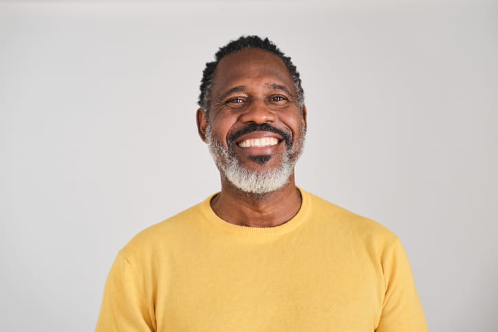 A man smiling at the camera.