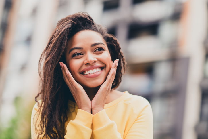 A woman smiling. 